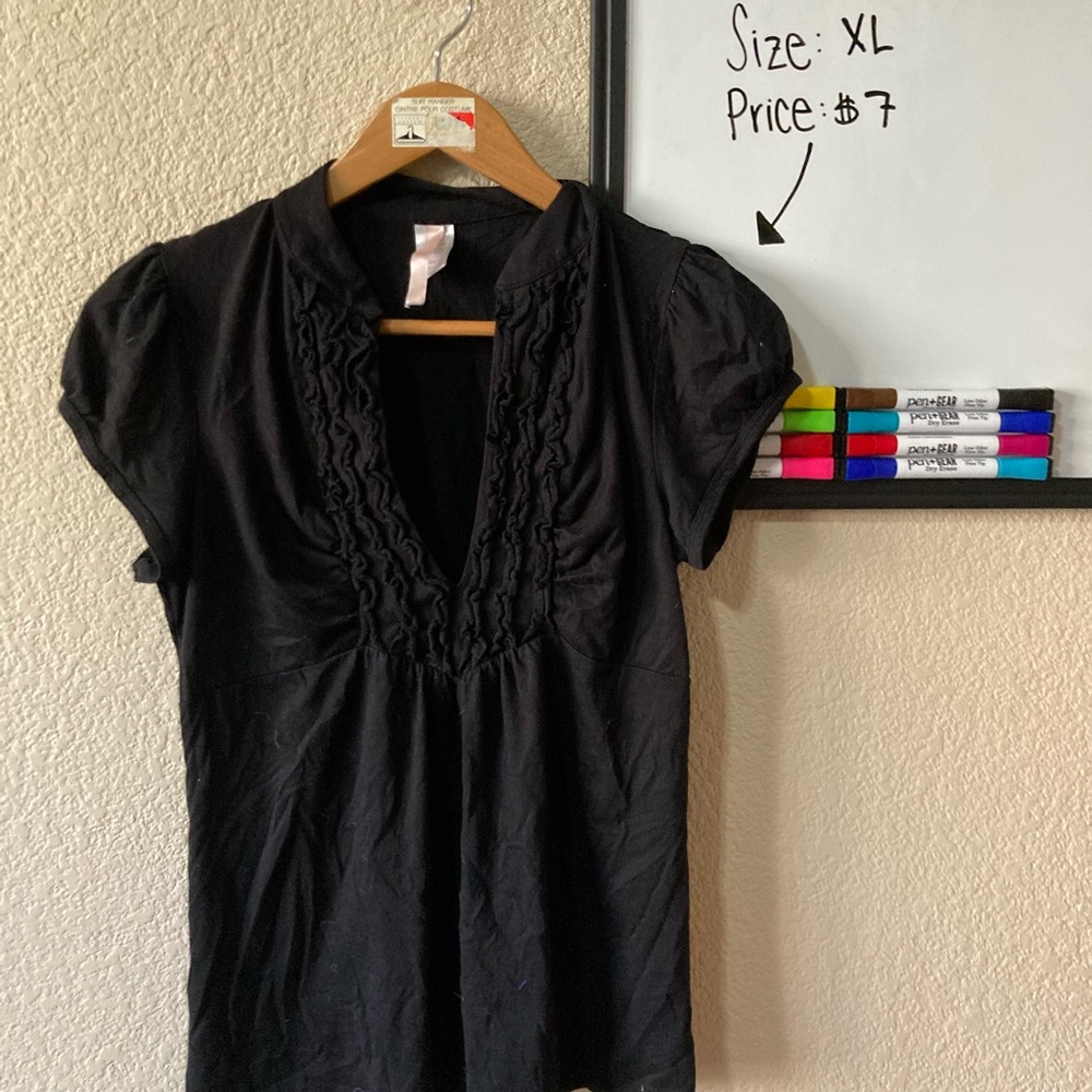 Black ruffled top